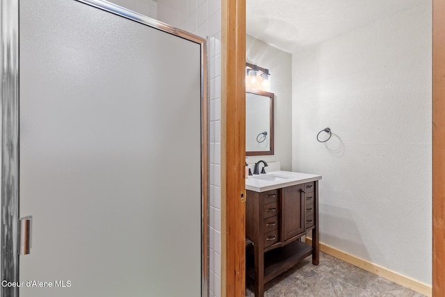 7722 W Clemetson Rd, Coeur Dalene, ID 83814 - full bathroom featuring vanity and a stall shower