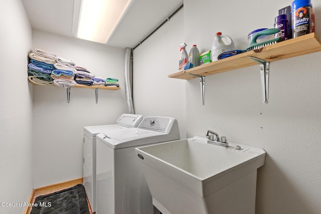 7722 W Clemetson Rd, Coeur Dalene, ID 83814 - washroom featuring washing machine and clothes dryer