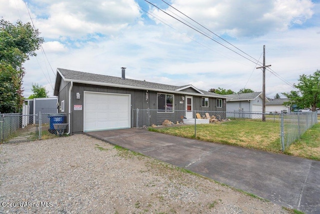 1503 E 3rd Ave, Post Falls, ID 83854 - single story home with concrete driveway, a garage, and board and batten siding