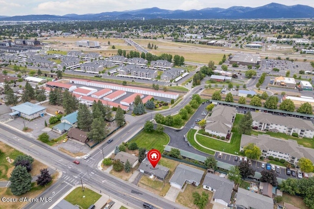 1503 E 3rd Ave, Post Falls, ID 83854 - aerial view of property's location featuring mountains and nearby suburban area