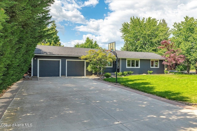 502 W 14th Ave, Post Falls, ID 83854 - view of front of property with an attached garage, driveway, and a front lawn