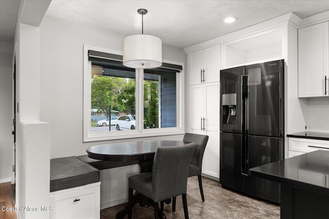 502 W 14th Ave, Post Falls, ID 83854 - dining area featuring a textured ceiling and recessed lighting