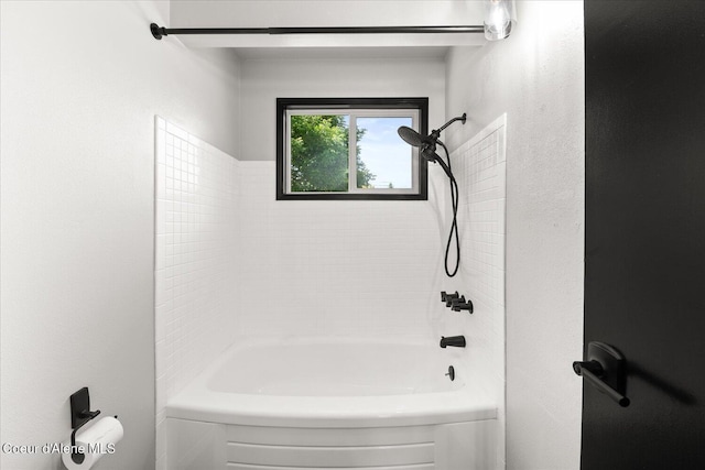 502 W 14th Ave, Post Falls, ID 83854 - full bathroom featuring bathing tub / shower combination and a textured wall