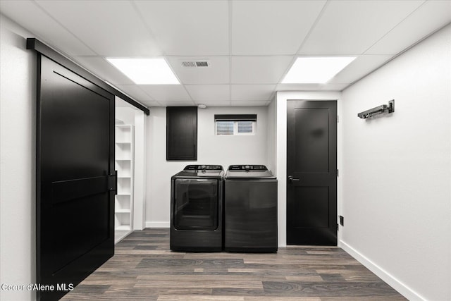 502 W 14th Ave, Post Falls, ID 83854 - laundry room featuring washer and dryer and dark wood-style floors