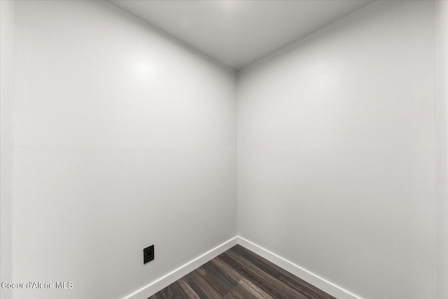 502 W 14th Ave, Post Falls, ID 83854 - spare room with baseboards and dark wood-type flooring