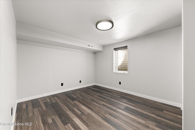 502 W 14th Ave, Post Falls, ID 83854 - empty room with baseboards and dark wood finished floors