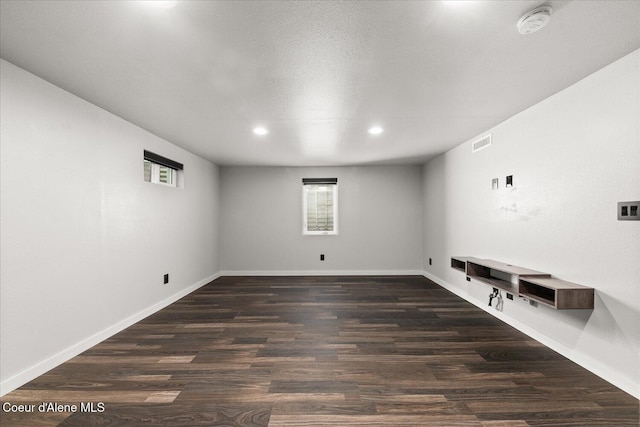 502 W 14th Ave, Post Falls, ID 83854 - empty room with recessed lighting, dark wood-style flooring, and a smoke detector