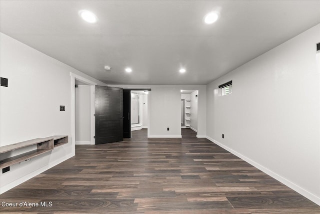 502 W 14th Ave, Post Falls, ID 83854 - unfurnished living room with recessed lighting and dark wood-type flooring