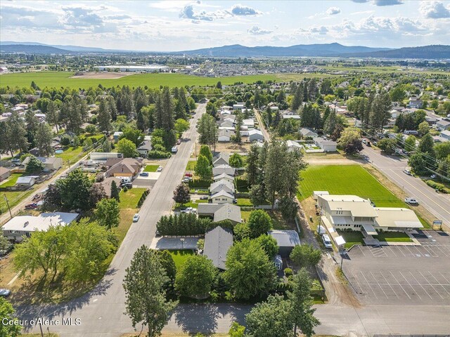 502 W 14th Ave, Post Falls, ID 83854 - aerial view of residential area featuring a mountainous background