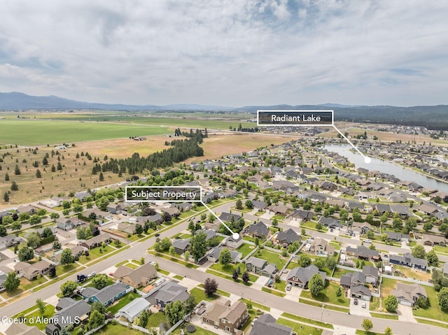 13417 N Halley St, Rathdrum, ID 83858 - aerial view of property and surrounding area with nearby suburban area and a nearby body of water