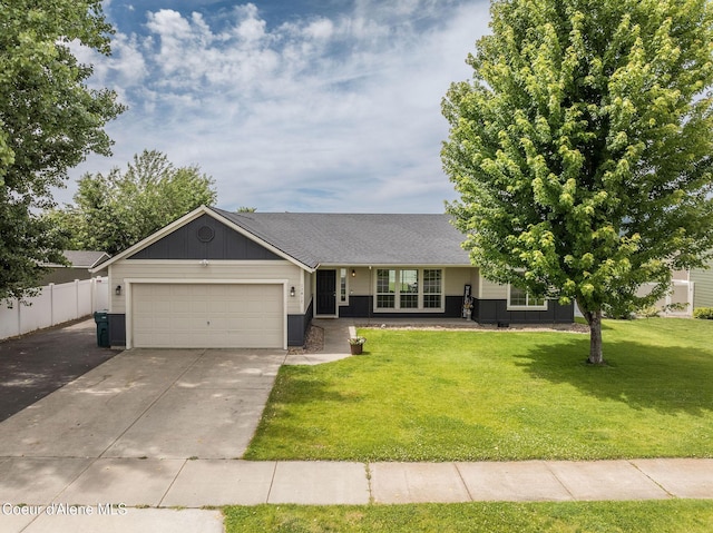 13417 N Halley St, Rathdrum, ID 83858 - ranch-style home with an attached garage, driveway, and a shingled roof