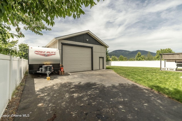 13417 N Halley St, Rathdrum, ID 83858 - detached garage with a mountain view and concrete driveway