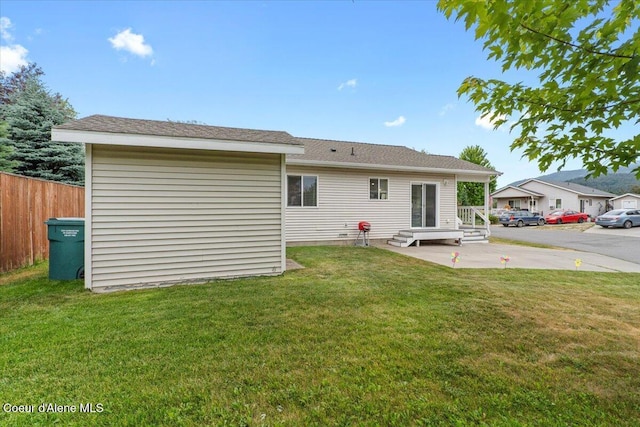 2270 W Linda Way, Post Falls, ID 83854 - back of property featuring a patio area