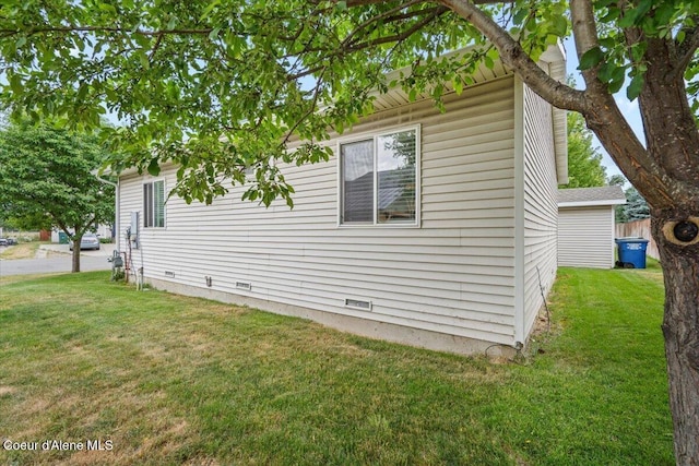 2270 W Linda Way, Post Falls, ID 83854 - view of side of home featuring a lawn and crawl space