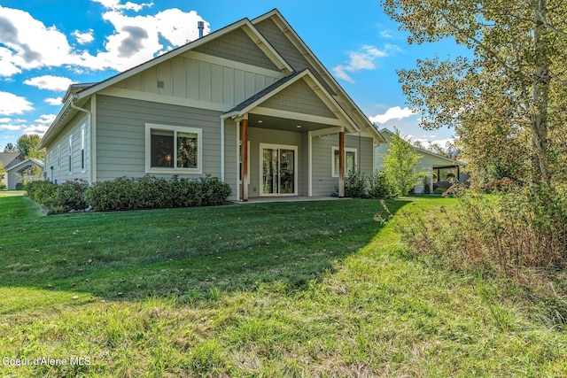 52 Peggys Ct, Dover, ID 83825 - view of front of home with a front yard and board and batten siding