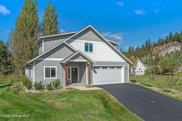 52 Peggys Ct, Dover, ID 83825 - view of front of home with driveway and a front yard