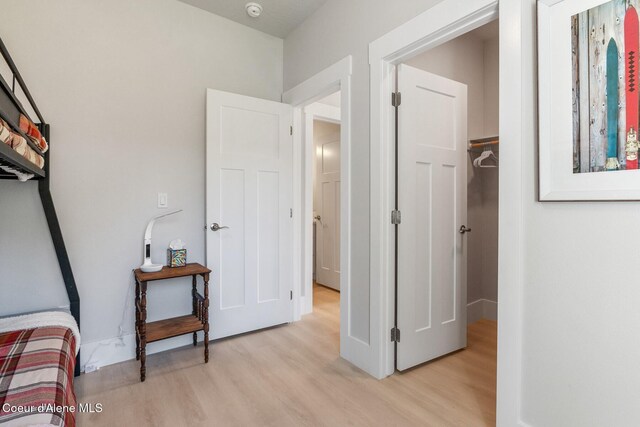 52 Peggys Ct, Dover, ID 83825 - bedroom with light wood-style flooring and baseboards