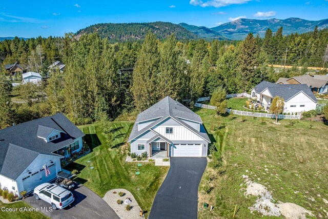 52 Peggys Ct, Dover, ID 83825 - view from above of property with a heavily wooded area and mountains