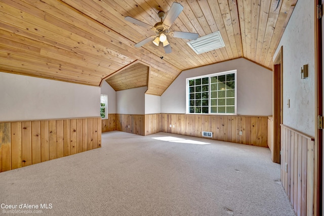 4900 E Hudlow Rd, Hayden, ID 83835 - additional living space with a wainscoted wall, a ceiling fan, carpet floors, wooden ceiling, and lofted ceiling