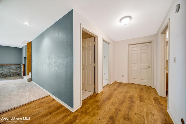 4900 E Hudlow Rd, Hayden, ID 83835 - hall with wood finished floors and baseboards
