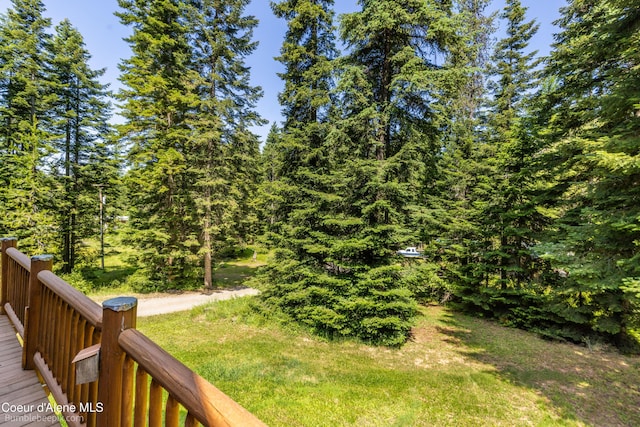 4900 E Hudlow Rd, Hayden, ID 83835 - view of yard with a wooded view
