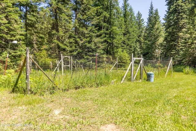 4900 E Hudlow Rd, Hayden, ID 83835 - view of yard featuring a view of trees