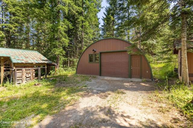 4900 E Hudlow Rd, Hayden, ID 83835 - detached garage featuring driveway