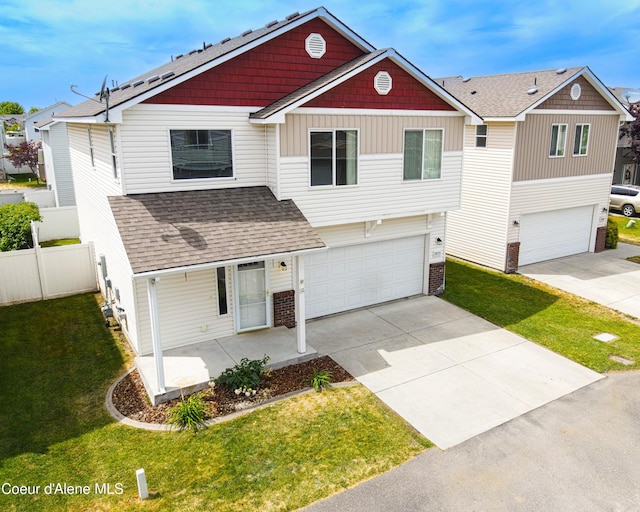 7833 N Hilliard Ct, Coeur Dalene, ID 83815 - view of front of house featuring a garage, concrete driveway, a shingled roof, and a porch