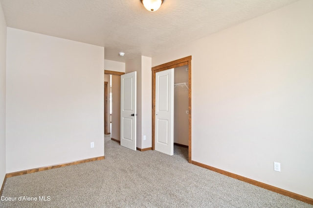 7833 N Hilliard Ct, Coeur Dalene, ID 83815 - spare room featuring carpet flooring and a textured ceiling