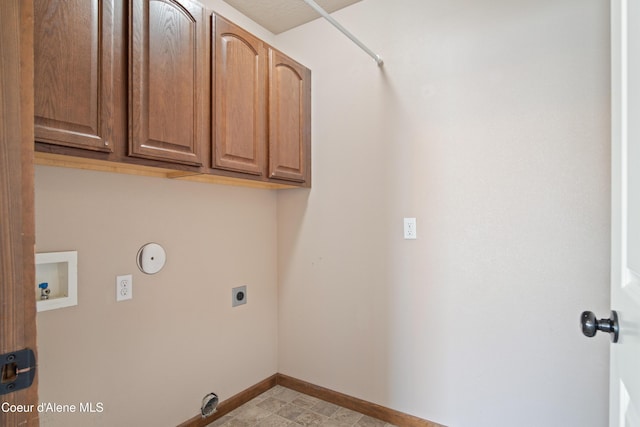 7833 N Hilliard Ct, Coeur Dalene, ID 83815 - laundry area with hookup for an electric dryer, hookup for a washing machine, and cabinet space
