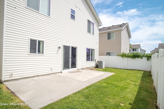7833 N Hilliard Ct, Coeur Dalene, ID 83815 - rear view of property with a fenced backyard and a patio area