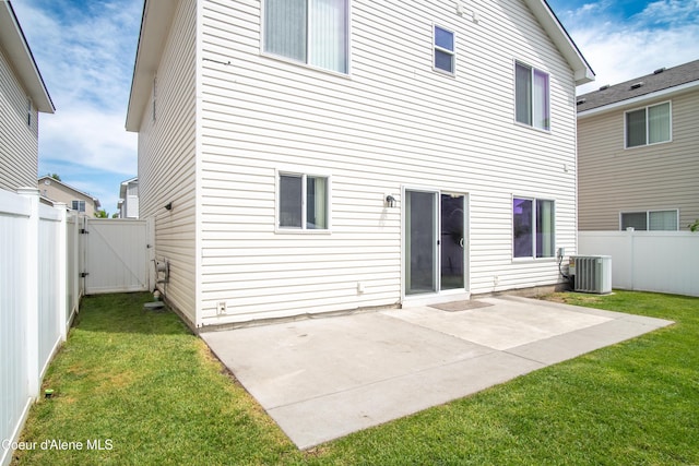 7833 N Hilliard Ct, Coeur Dalene, ID 83815 - rear view of house with a gate, a fenced backyard, and a patio