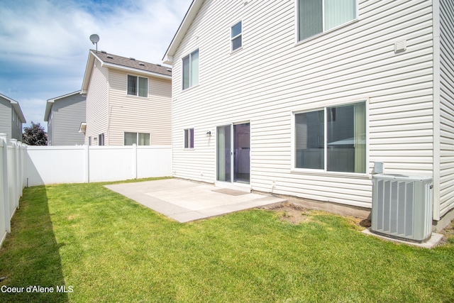 7833 N Hilliard Ct, Coeur Dalene, ID 83815 - rear view of house with a patio area and a fenced backyard