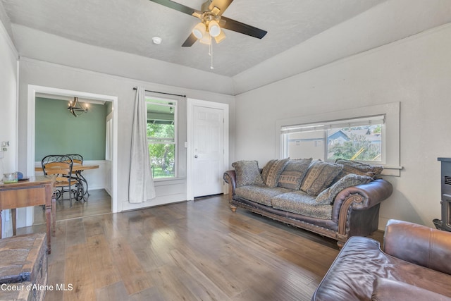 32271 N 5th Ave, Spirit Lake, ID 83869 - living room with wood finished floors, a ceiling fan, and a chandelier