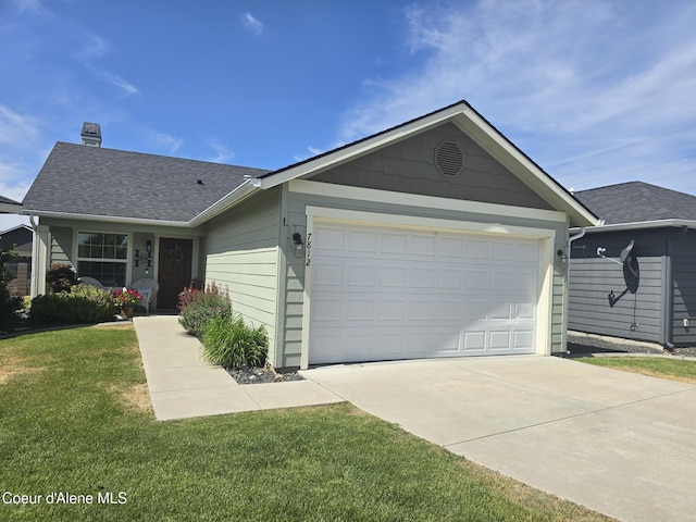 7812 W Kayak Ct, Rathdrum, ID 83858 - ranch-style home with a garage, driveway, a front lawn, a chimney, and roof with shingles
