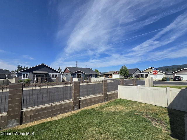 7812 W Kayak Ct, Rathdrum, ID 83858 - fenced yard featuring a residential view