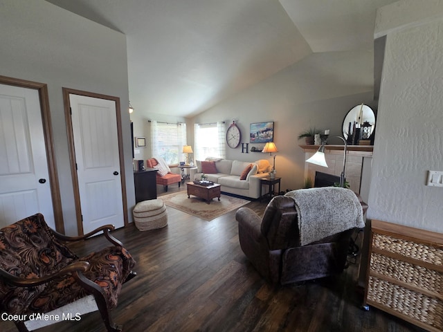 7812 W Kayak Ct, Rathdrum, ID 83858 - living room with vaulted ceiling and dark wood-style floors