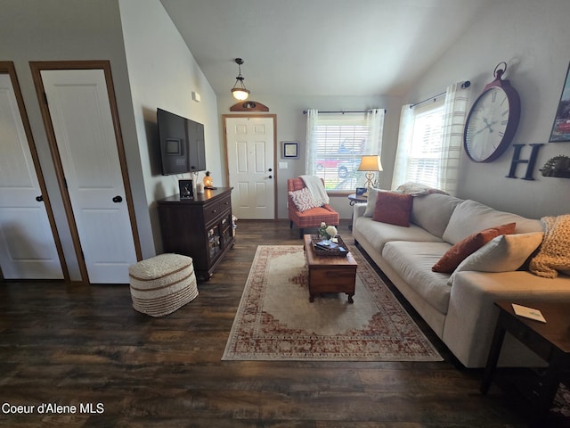 7812 W Kayak Ct, Rathdrum, ID 83858 - living room with lofted ceiling and dark wood-style floors