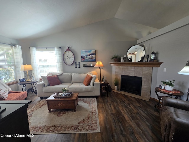 7812 W Kayak Ct, Rathdrum, ID 83858 - living area featuring lofted ceiling, wood finished floors, and a tile fireplace