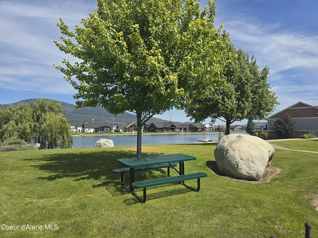 7812 W Kayak Ct, Rathdrum, ID 83858 - surrounding community with a lawn, a water view, and a residential view