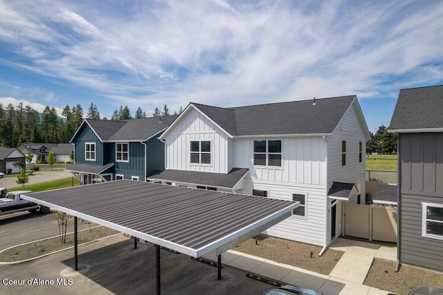 8 Potlatch Loop, Priest River, ID 83856 - rear view of house with board and batten siding