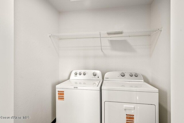 8 Potlatch Loop, Priest River, ID 83856 - washroom with washing machine and clothes dryer
