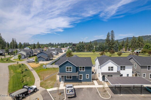 8 Potlatch Loop, Priest River, ID 83856 - aerial view of residential area with a mountain backdrop