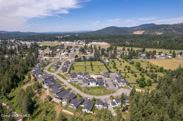 8 Potlatch Loop, Priest River, ID 83856 - aerial overview of property's location with mountains and nearby suburban area