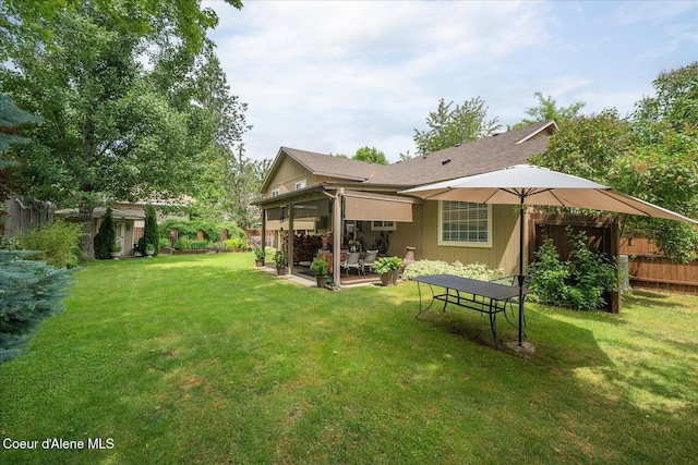 2372 E Thomas Hill Dr, Coeur Dalene, ID 83815 - back of property with a storage shed and a patio area