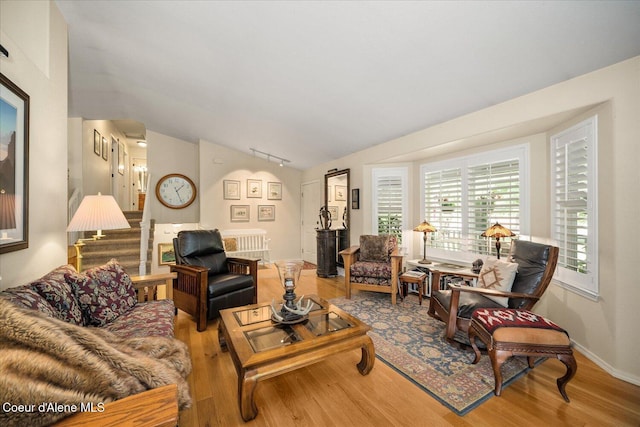 2372 E Thomas Hill Dr, Coeur Dalene, ID 83815 - living area featuring wood finished floors and vaulted ceiling