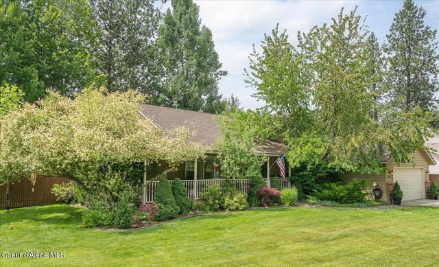2372 E Thomas Hill Dr, Coeur Dalene, ID 83815 - view of front facade with a porch and roof with shingles
