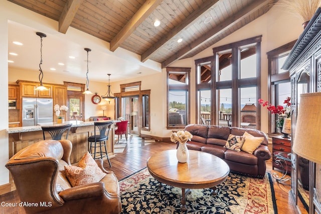 5841 W Clemetson Rd, Coeur Dalene, ID 83814 - living area featuring light wood finished floors, wood ceiling, and recessed lighting