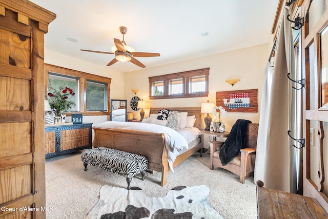 5841 W Clemetson Rd, Coeur Dalene, ID 83814 - bedroom with carpet floors and a ceiling fan