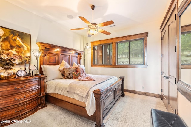 5841 W Clemetson Rd, Coeur Dalene, ID 83814 - bedroom with light carpet and ceiling fan
